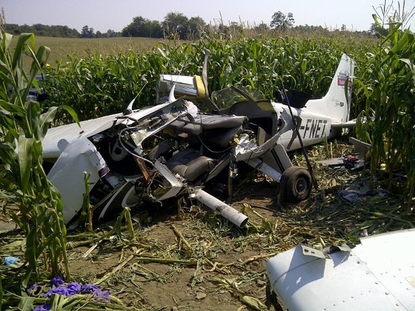  Body of the crashed Cessna 172, with left wing removed, in a corn field near Moorefield, Ontario