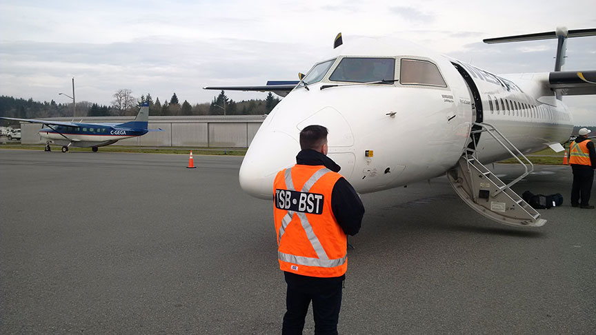 Front view of the Bombardier Dash 8 Q400 turboprop after it landed in Nanaimo