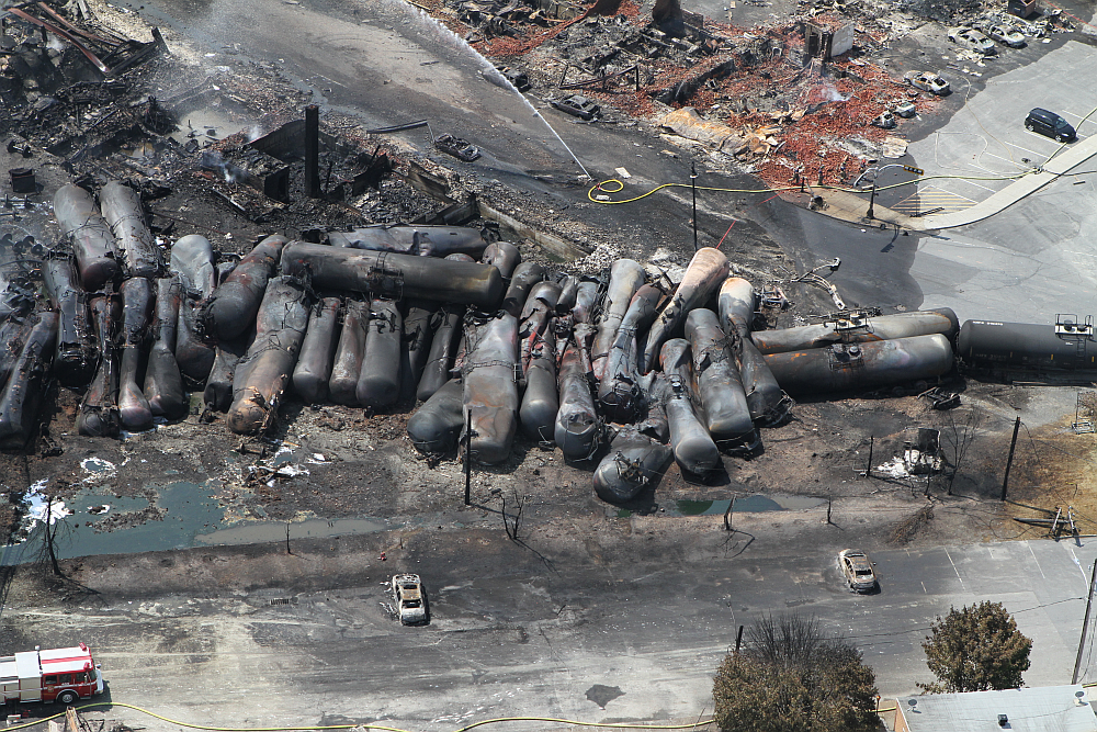 Aerial view of charred freight train in Lac-Megantic