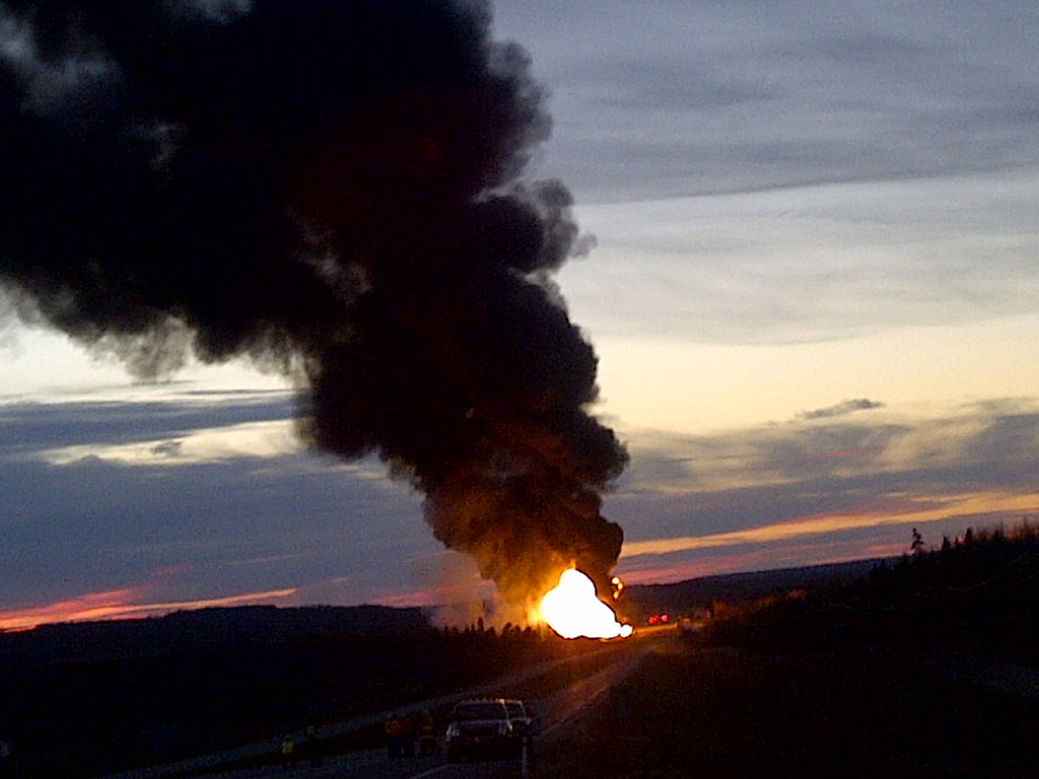 Controlled burn of product in derailed tank cars near Gainford, Alberta