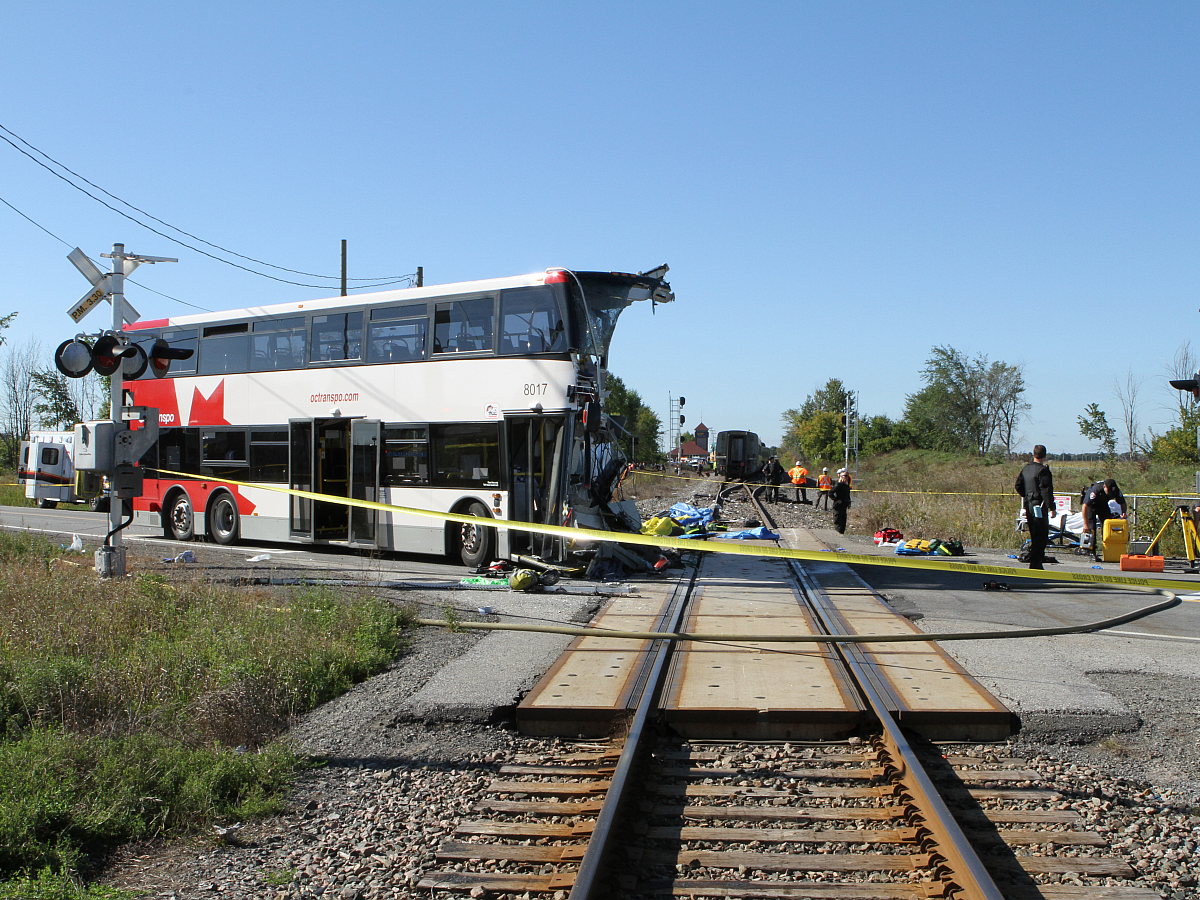 The OC Transpo double-decker bus at the accident scene, looking west along the track