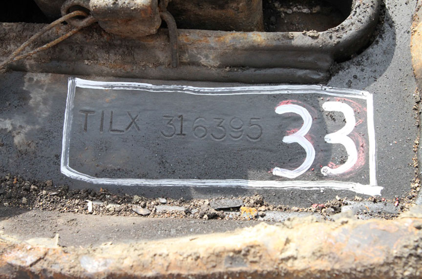 Image of stamped marking on stub sill of field car no. 33