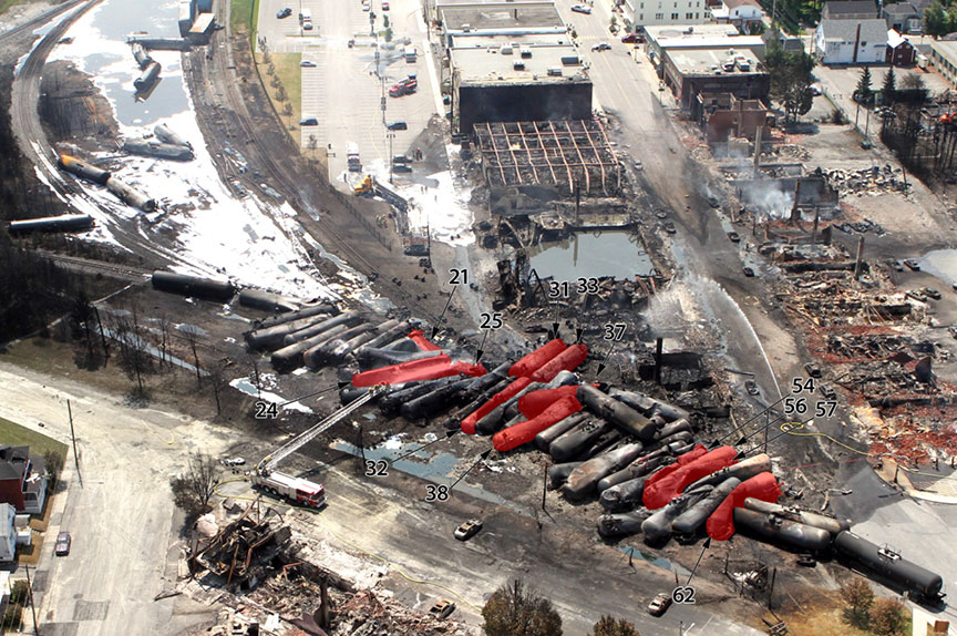 Aerial photograph showing cars with breaches from impact-damaged PRDs indicated in red