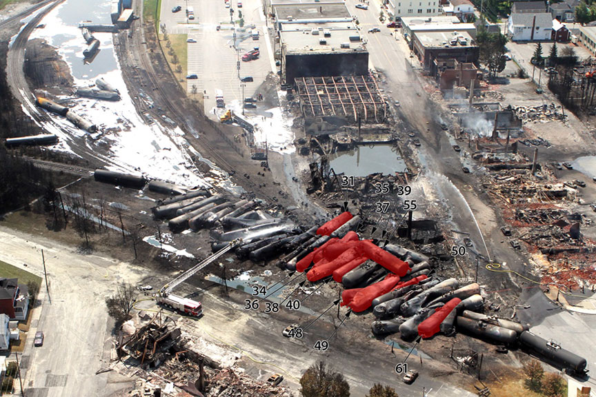 Aerial photograph showing cars with burn-throughs indicated in red