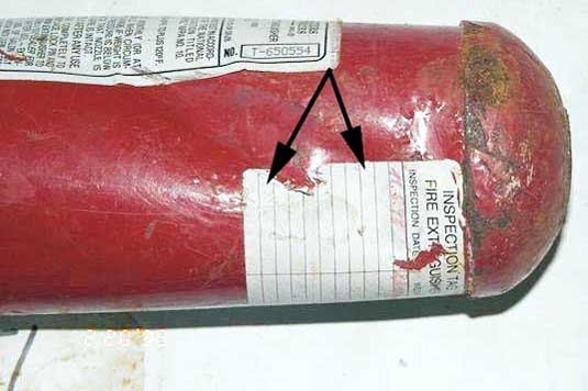 Recovered Halon extinguisher - Exhibit 1-7151 - impact mark