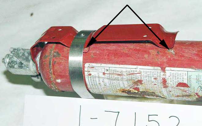 Recovered Halon extinguisher - Exhibit 1-7152 - gouge mark