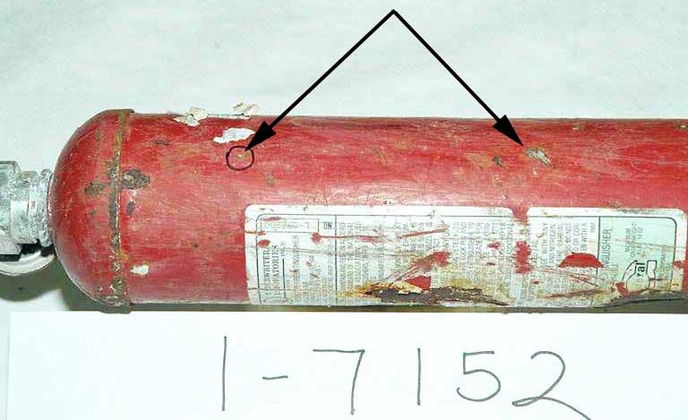 Recovered Halon extinguisher - Exhibit 1-7152 - impact mark