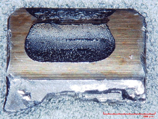 Photo of close up photo of a tooth from the failed gear