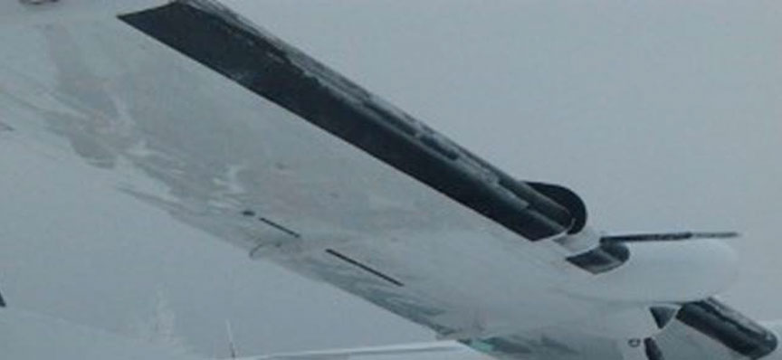 Image of the ice on leading edge of wing before the accident flight