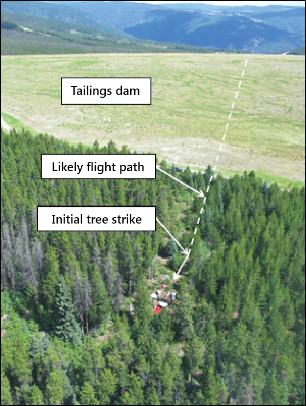 Aerial view of the accident site, showing the likely flight path before the initial tree strike