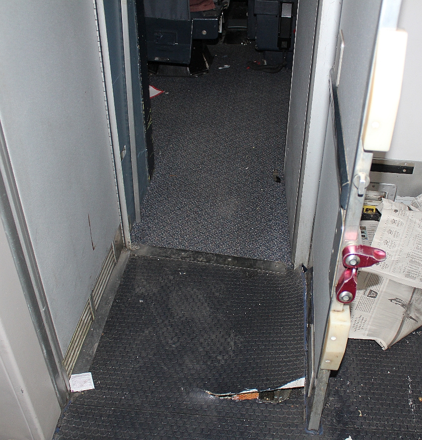 Floor damage aft of cockpit door