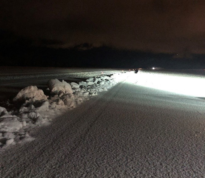 Windrow and occurrence aircraft left main landing gear track along Runway 33. Image taken approximately 5 hours after the occurrence (Source: Terrace Airport)