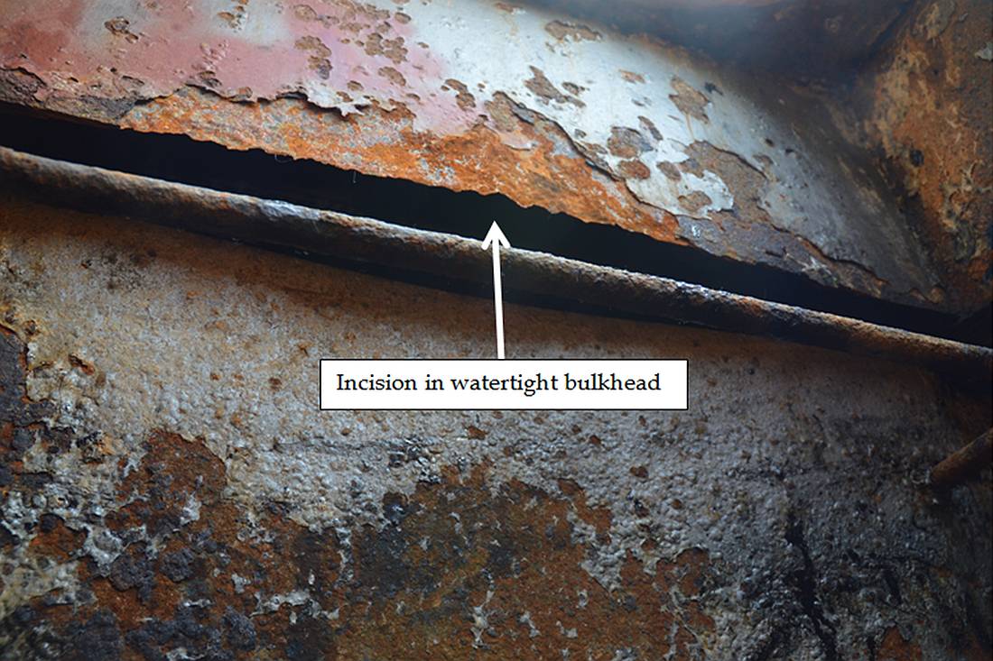 Close-up photo of the incision in the bulkhead