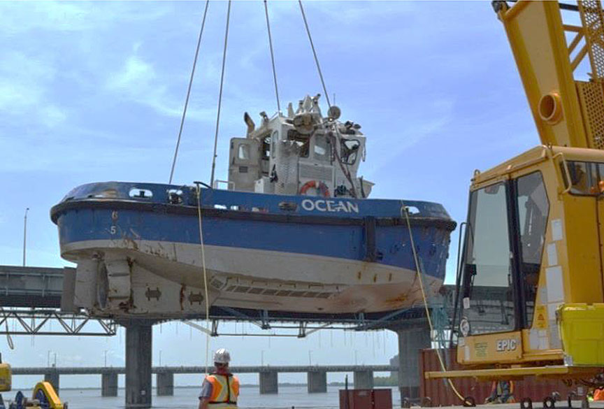 Ocean Uannaq being raised from the riverbed