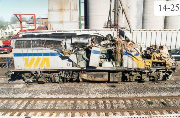 Right side shown after locomotive was righted. Damage is more extensive at the front right and along the right side of the locomotive.