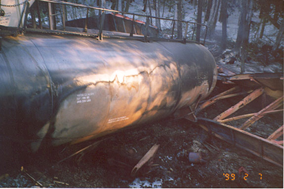 Fire-damaged jacket of loaded tank car of LPG (CGTX 63501)
