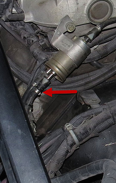 Image showing crimped steel ring securing the connector of an identical, undamaged, belt loader