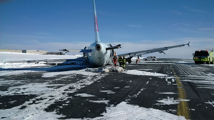 Photo of the rear of aircraft on runway