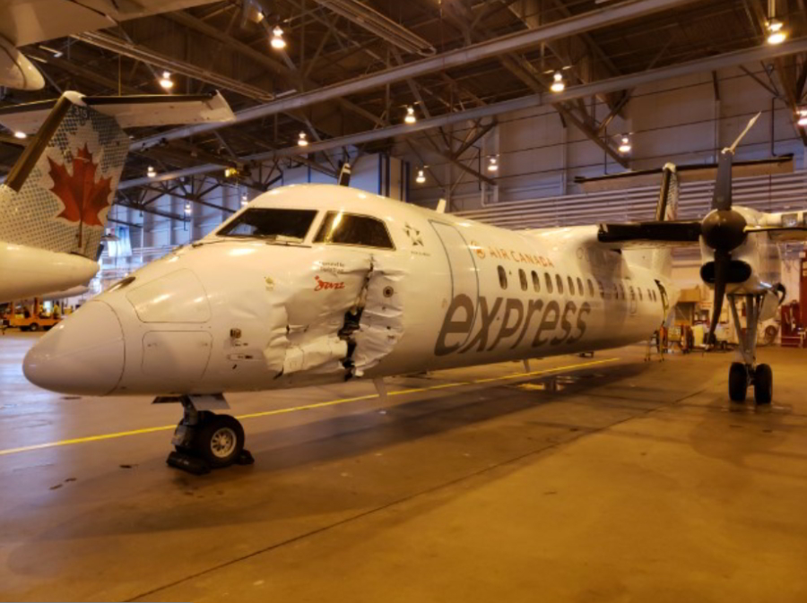 Damage on the aircraft that was struck by a fuel truck at the Toronto Pearson International Airport