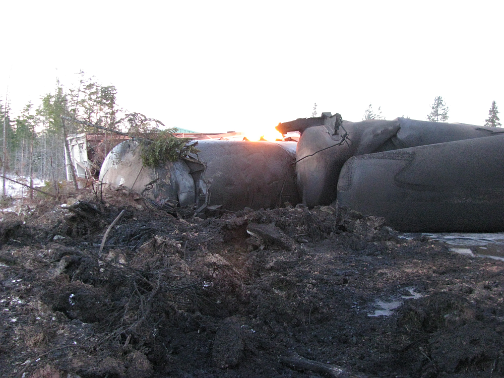 Photo 5. Damaged tanker cars near Plaster Rock, New Brunswick accident site