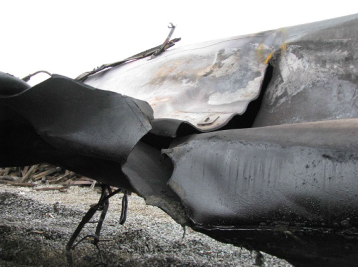 Image of Tank car CTCX 735617, rupture in shell, as decribed in text