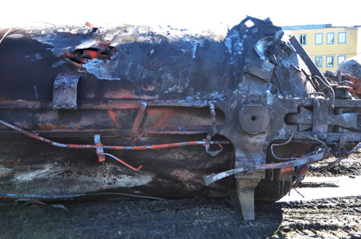 Image of Tank car NATX 302784, burn-through in shell, as decribed in text