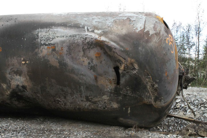 Image of Tank car NATX 303128, shell 1, as decribed in text