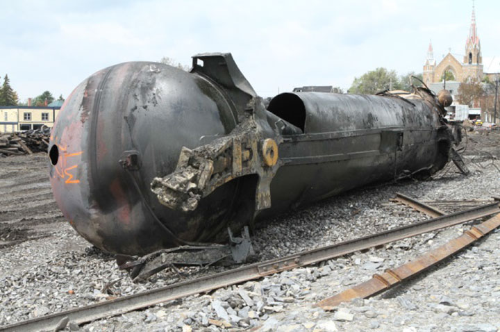 Image of Tank car TILX 316330, A end, as decribed in text
