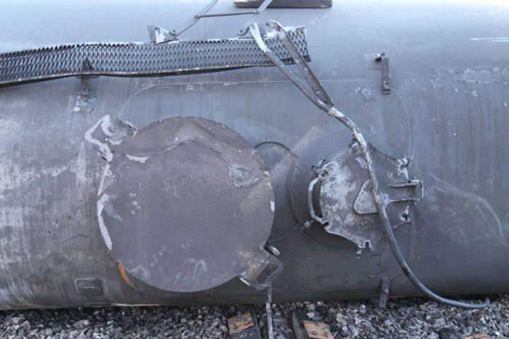 Image of Tank car TILX 316338, manway, as decribed in text