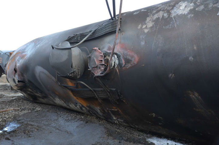 Image of Tank car TILX 316523, manway, as decribed in text