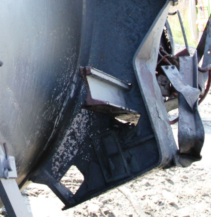 Image of Tank car TILX 316547, rail piece through BR bolster, as decribed in text