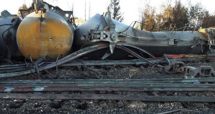 Image of Tank car TILX 316570, photo showing rails, as decribed in text