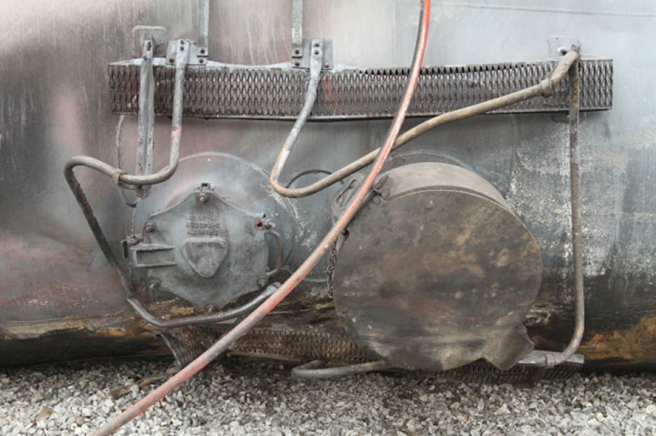 Image of Tank car WFIX 130638, manway, as decribed in text
