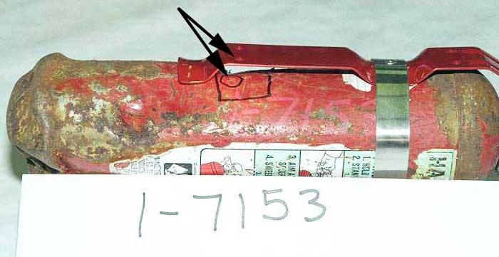 Recovered halon extinguisher - Exhibit 1-7153 - impact mark