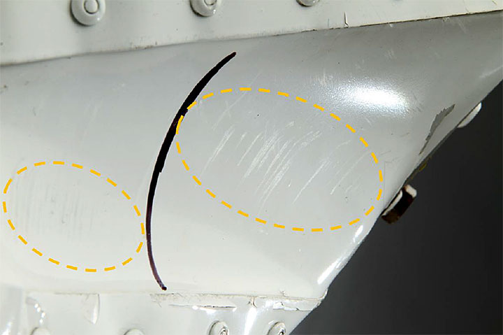 Image of scratches on aileron rib