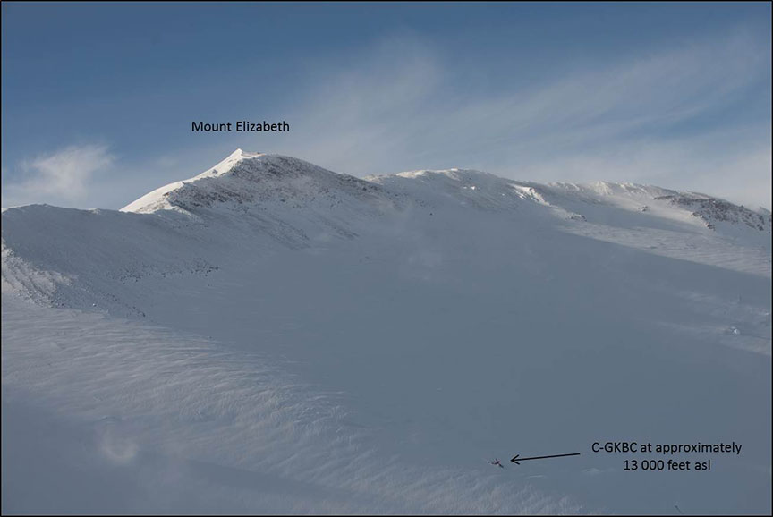 Image of wreckage of C-GKBC at about 13 000 feet asl on Mount Elizabeth, looking north