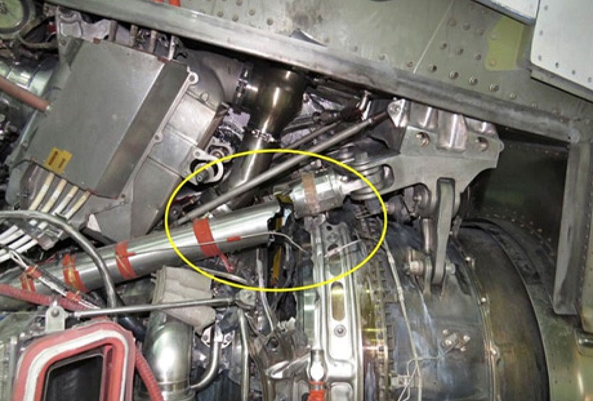 Damage to left-engine outboard thrust link and fire detection loops (Source: Bombardier Inc.)