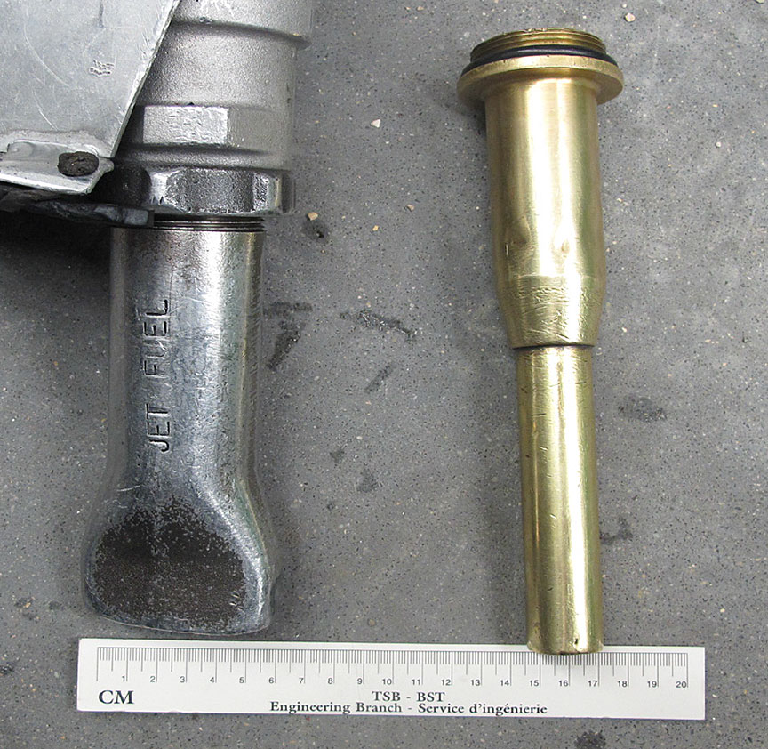 Exemplar flared spout (left) and reduced-diameter (brass) spout