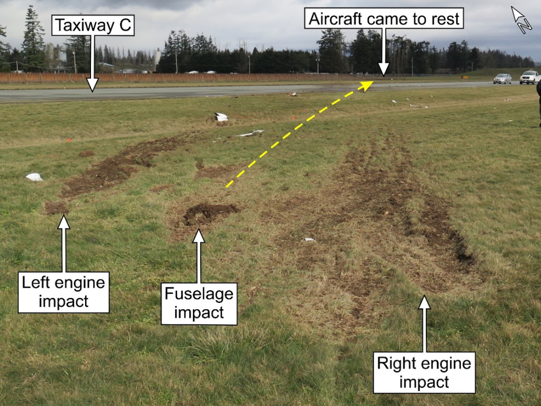   The aircraft's initial point of collision with terrain and the direction    of travel (photograph taken 27 February 2018) (Source: TSB)<br>