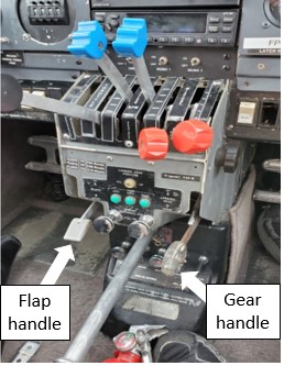 View of landing gear and flap handles (Source: TSB)