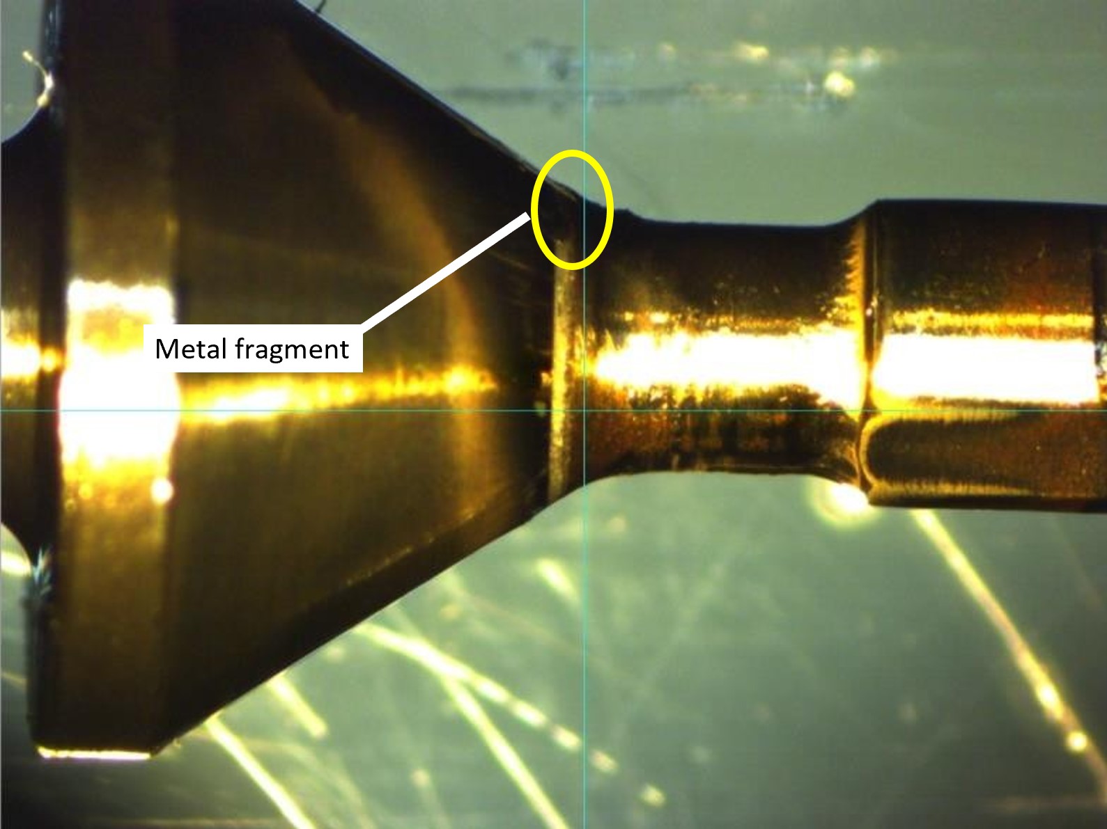 Location of the metal fragment on the sealing surface on the high-pressure valve (Source: AeroControlex Group, Inc, with TSB annotations)
