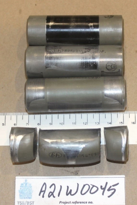 Photo of the occurrence helicopter’s 4 main rotor hub strap retaining pins (Source: TSB)