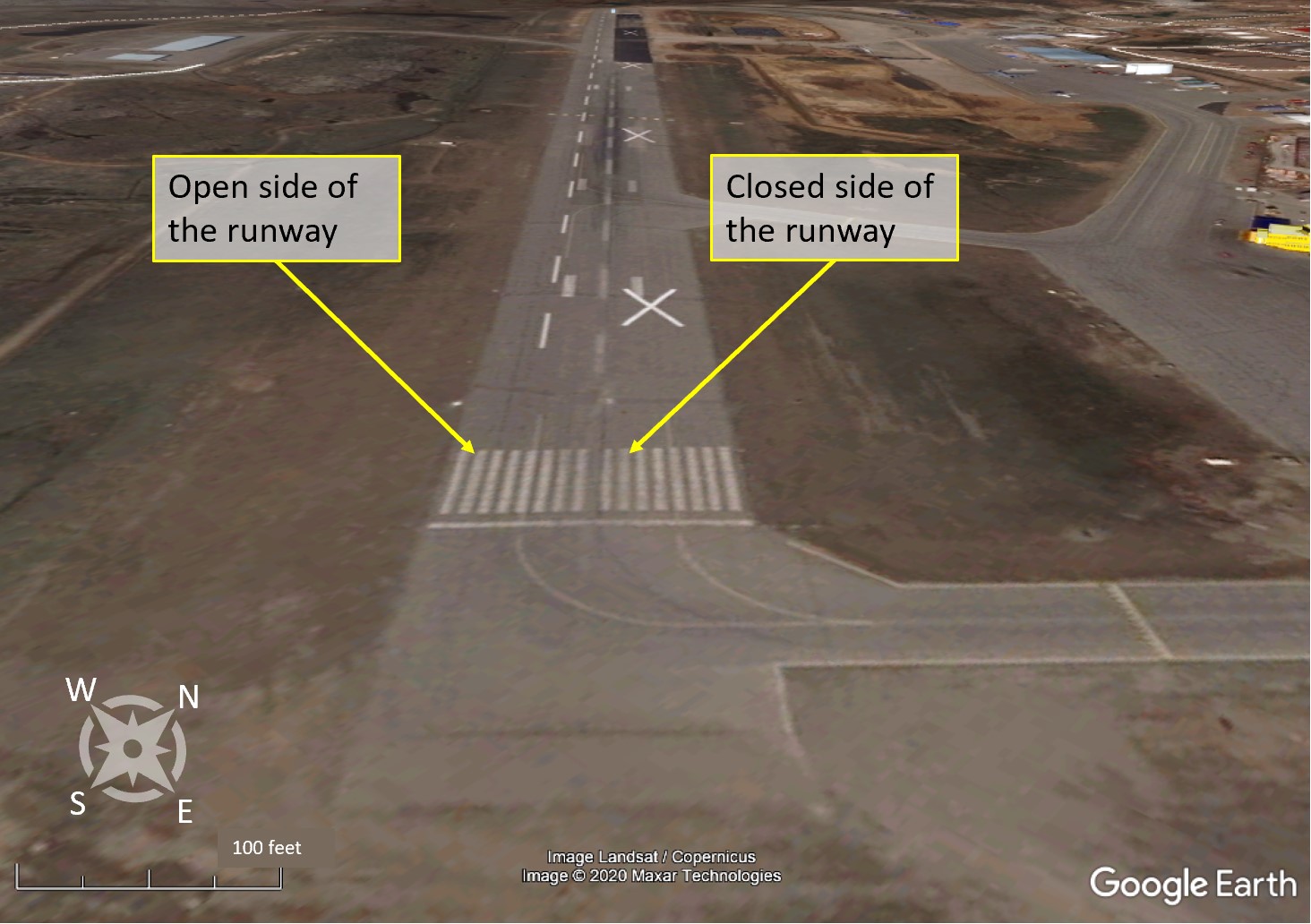 Aerial view of the runway markings used at the Iqaluit Airport during construction (Source: Google Earth, with TSB annotations)