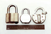 Image of a high-security switch lock on left as compared to a standard switch lock on right