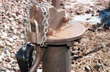 Image of the switch handle fully lowered into retaining slot and locked