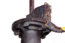 Image of an unlocked and partially raised switch handle