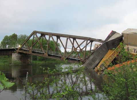 Image of the collapsed south end of the railway bridge