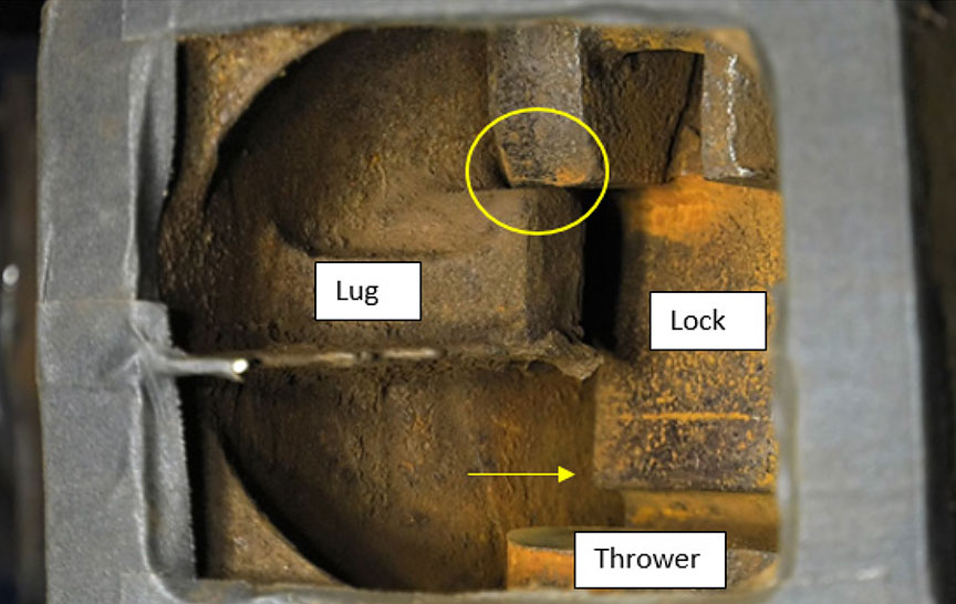 Close-up of subject lock with the upper step resting on the positioning lug