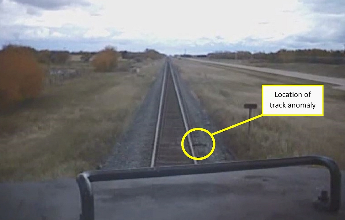 Forward-facing camera view of the point of derailment from a previous eastbound train, showing the track anomaly (Source: Canadian National Railway Company, with TSB annotations)