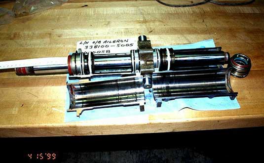 Left outboard aileron actuator - cylinder rods - captured position